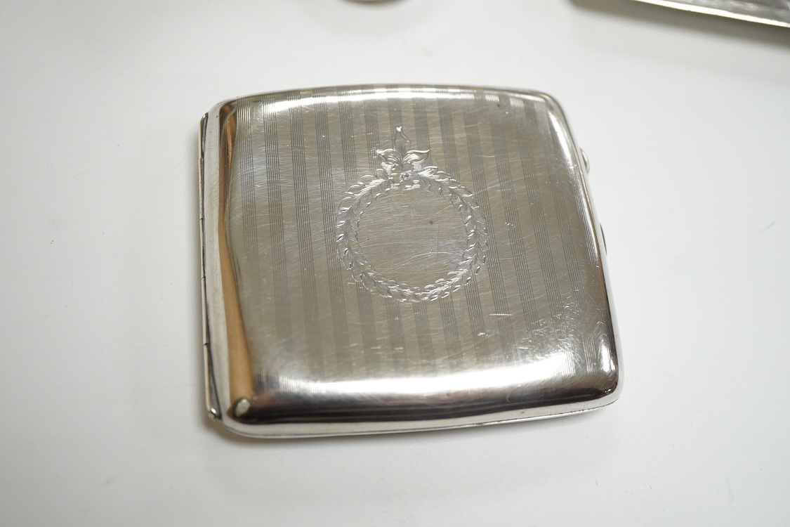 A continental 800 standard oblong shaped dish, of fluted design, together with a Peruvian sterling dish and similar pill box and a George V silver cigarette case, 16.6oz.